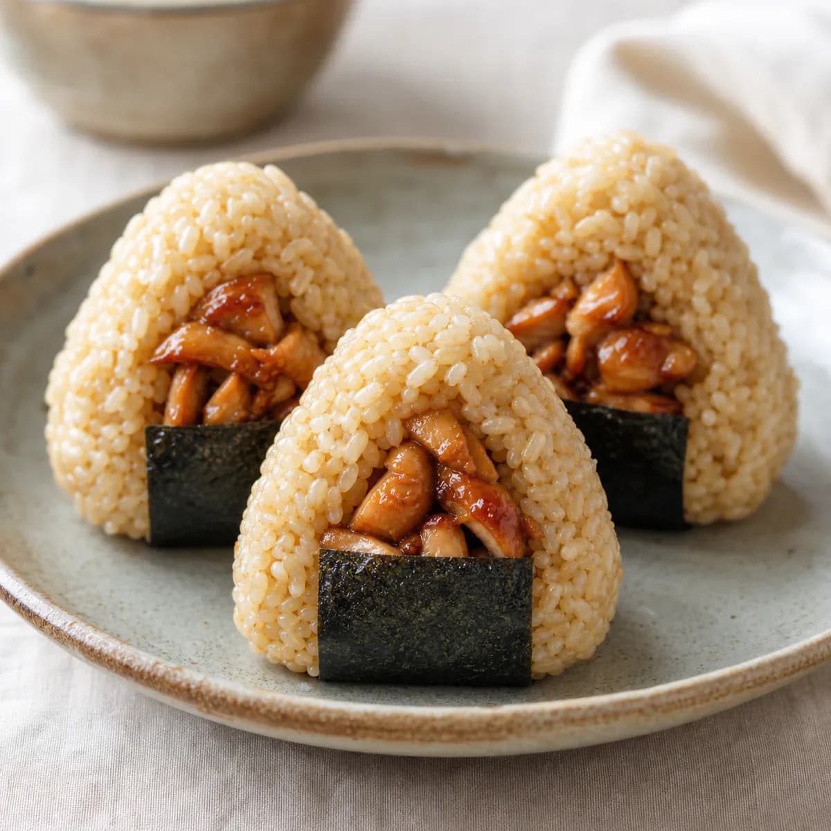 Teriyaki chicken breakfast onigiri wrapped with toasted nori
