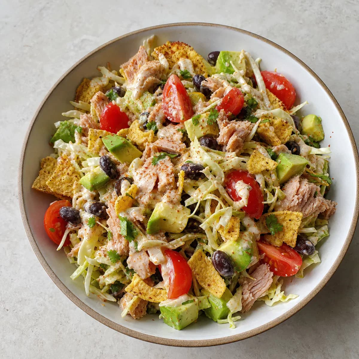 Chile lime tuna salad with black beans and crisp tostada pieces