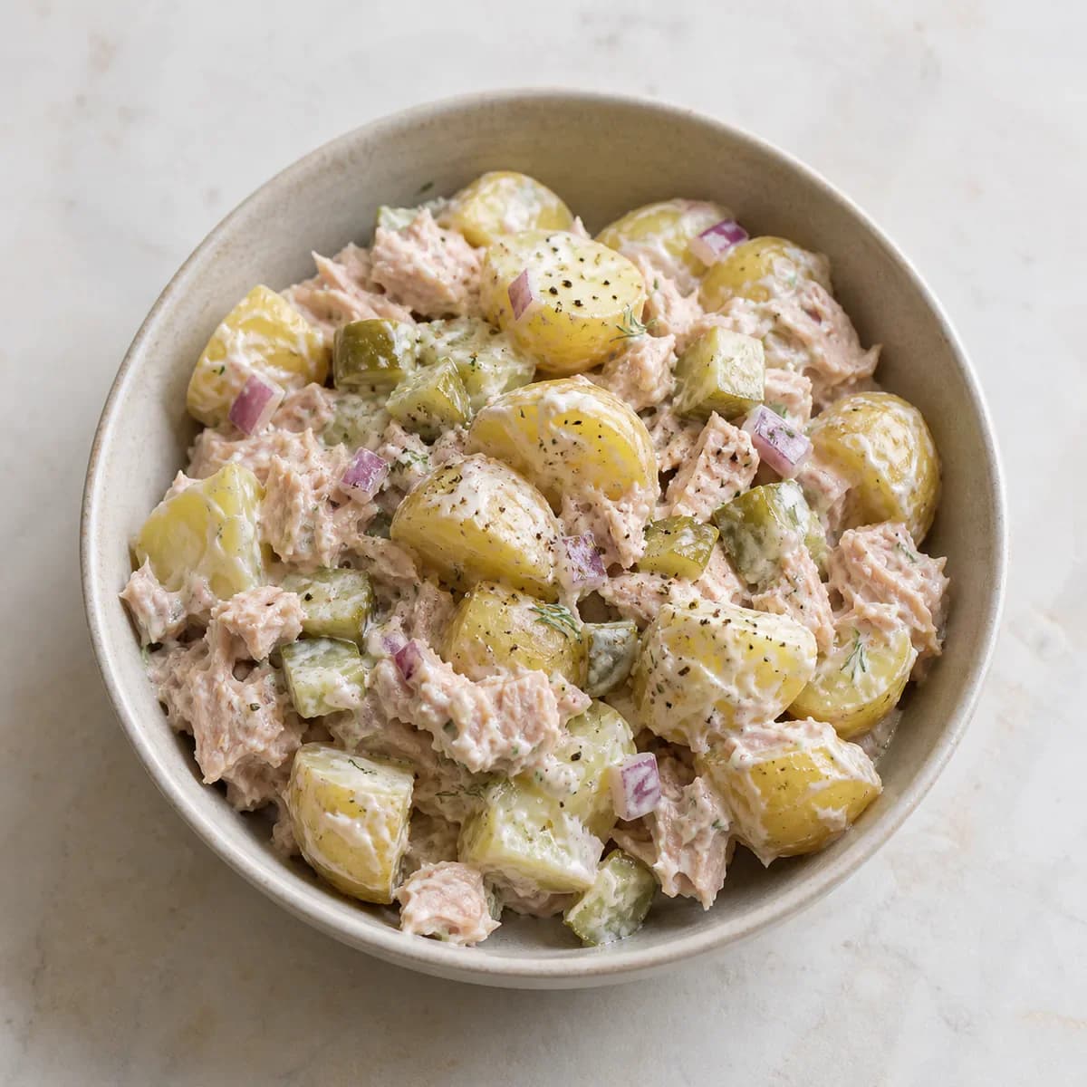 Dill pickle tuna potato salad with red onion