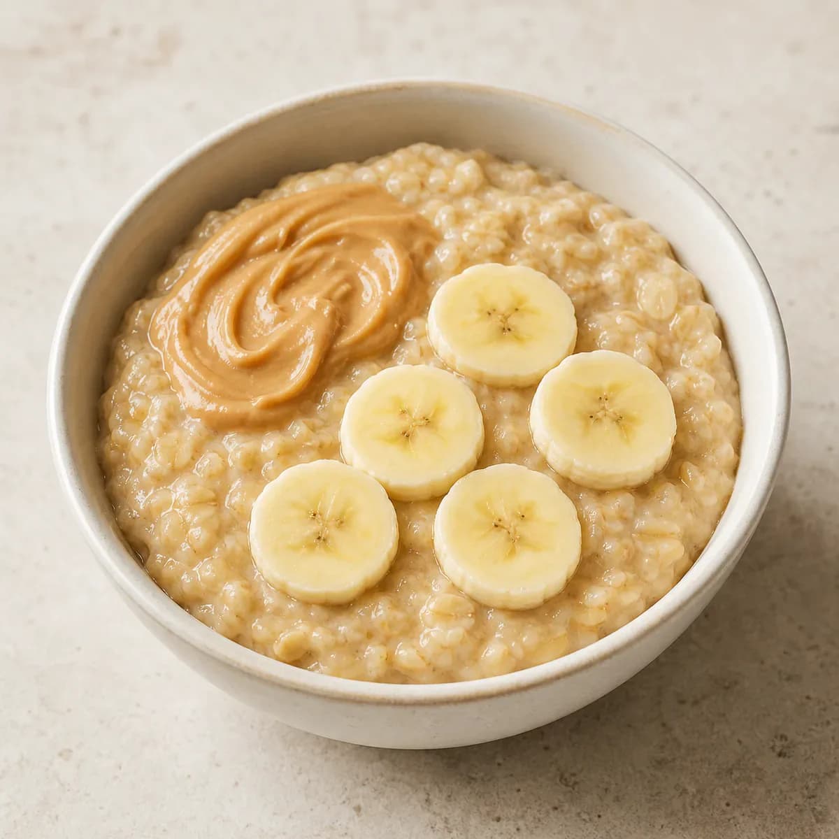 Warm peanut butter banana oatmeal served as one complete portion
